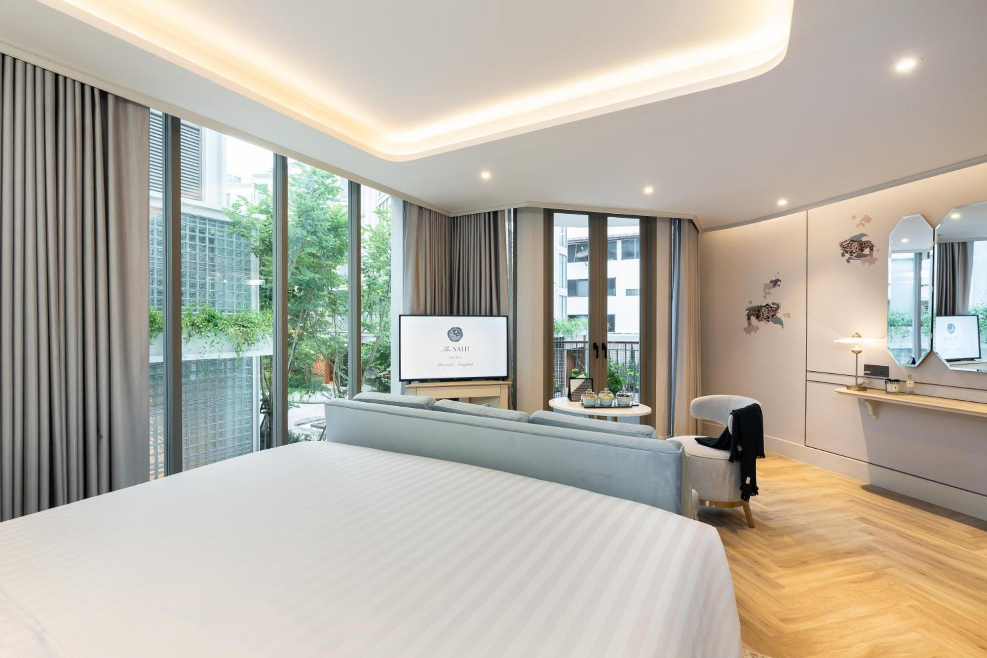 The Salil Hotel Riverside Bangkok Exterior foto Deluxe Room