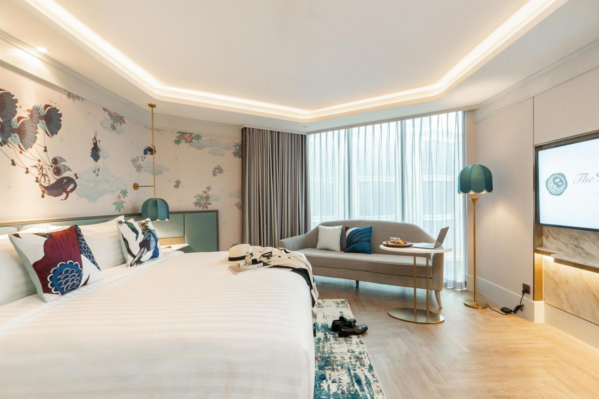 The Salil Hotel Riverside Bangkok Exterior foto Deluxe Room